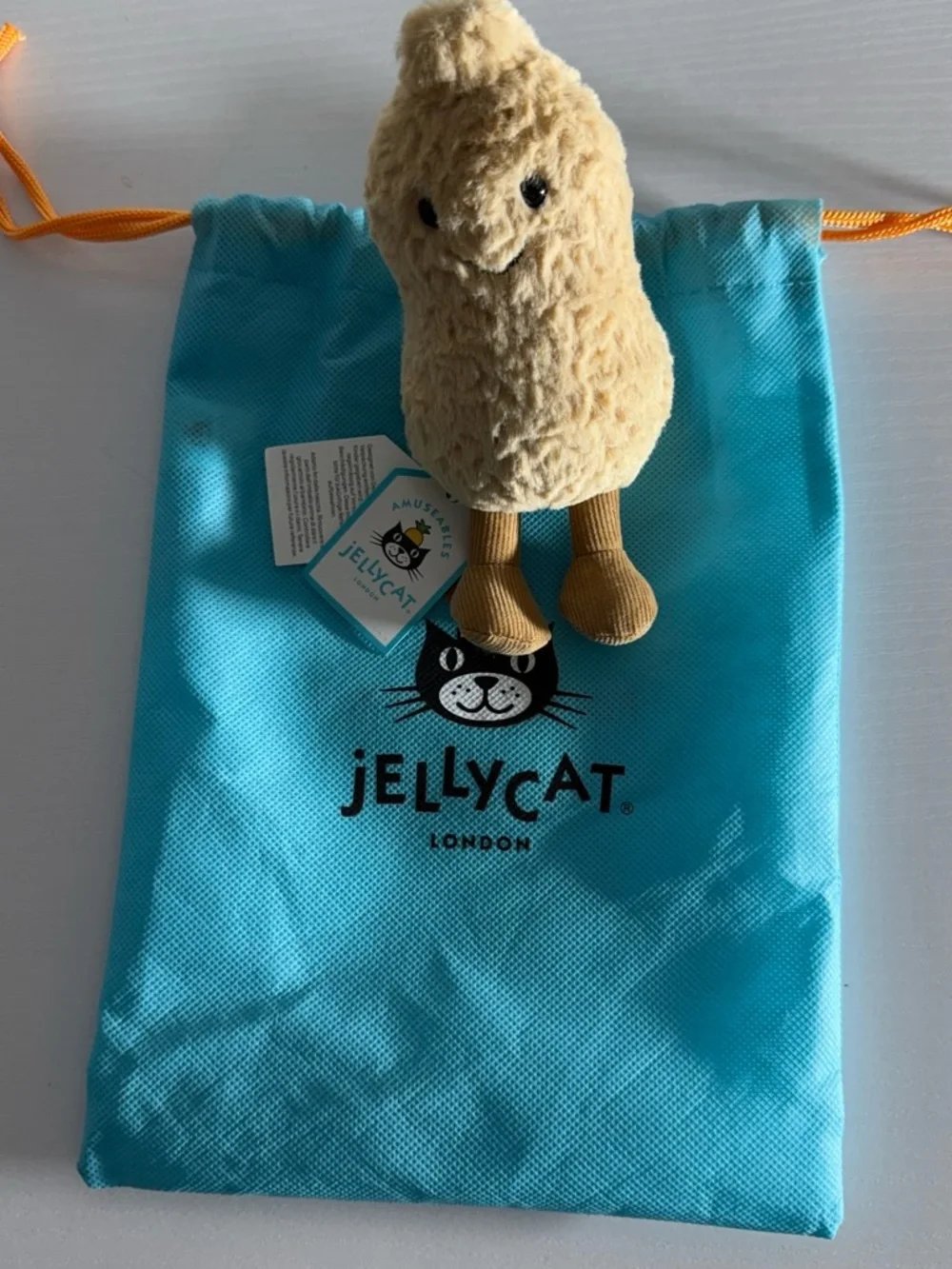 Jellycat Cream Plush Amuseables with Tan Corded Legs